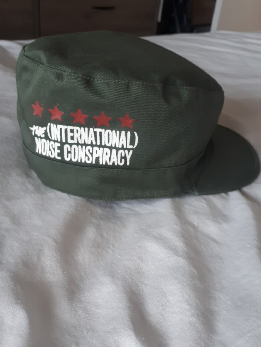 Autographed International Noise Conspiracy Cap